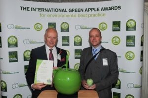 Wiser Recycling's Russell Hirst receiving Green Apple Award